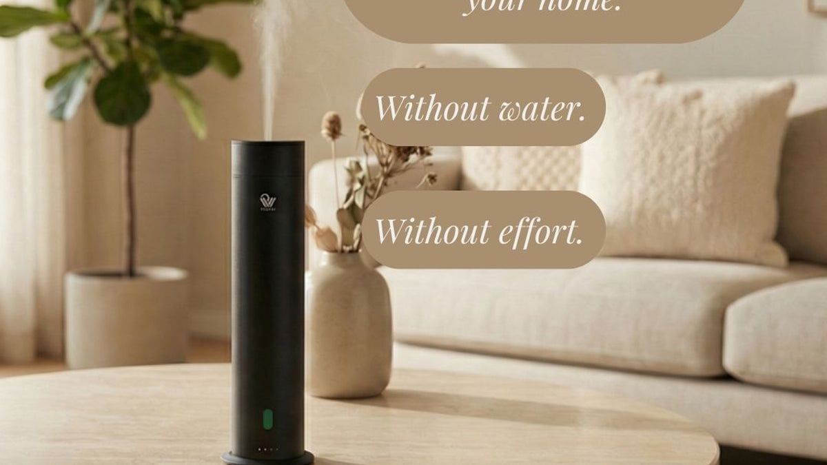 Pure One diffuser positioned on a wooden table in a home interior
